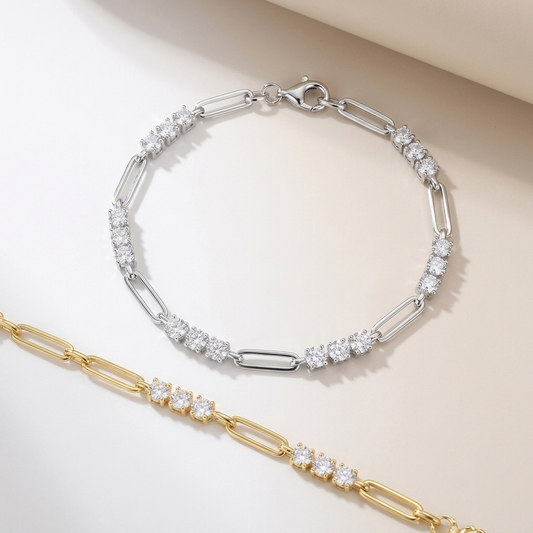Two gold and silver 1.8 carat minimalist moissanite bracelets in sterling silver on a light background