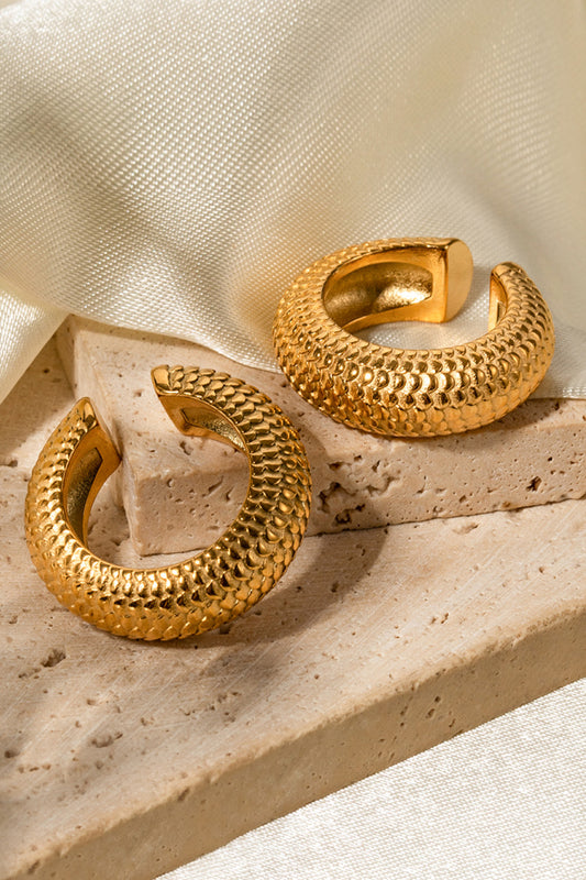 Textured gold and platinum-tone stainless steel cuff earrings