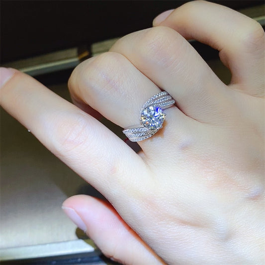 Elarisse 1-carat moissanite twist engagement ring in platinum-plated sterling silver by MerchLuxx