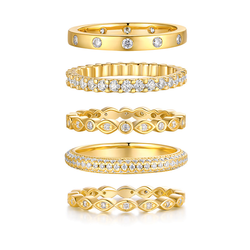 Set of Aurielle moissanite stackable ring set in 18K gold-plated sterling silver layered luxury bands by MerchLuxx \ on a white background