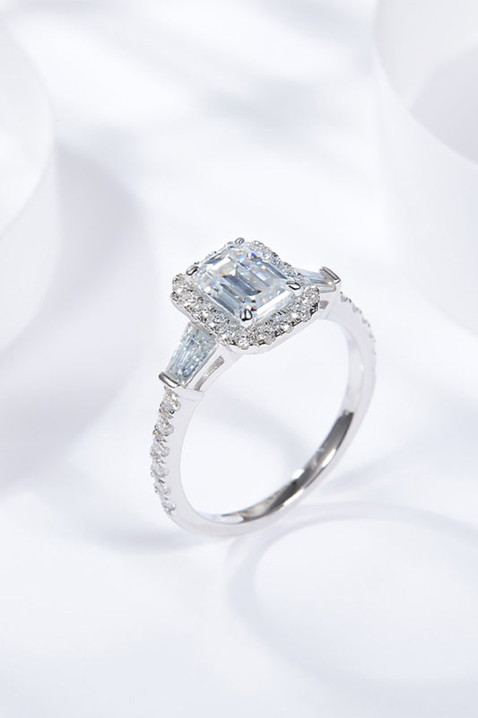Virella emerald-cut moissanite halo ring in platinum-plated sterling silver by MerchLuxx