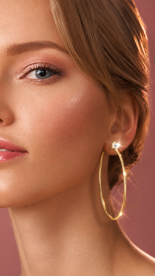 Woman wearing Adoréa 18K gold plated sterling silver moissanite hoop earring
