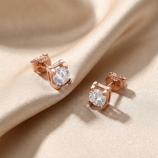 0.5 carat moissanite stud earrings in sterling silver with platinum and rose gold plating