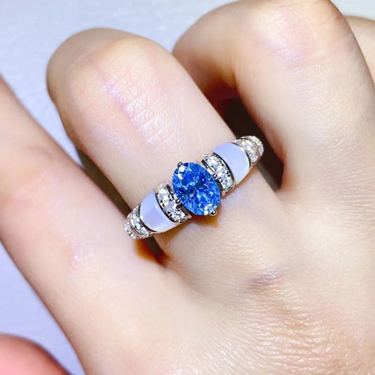 Veloria 1-carat pink and blue moissanite accent ring in platinum-plated sterling silver by MerchLuxx