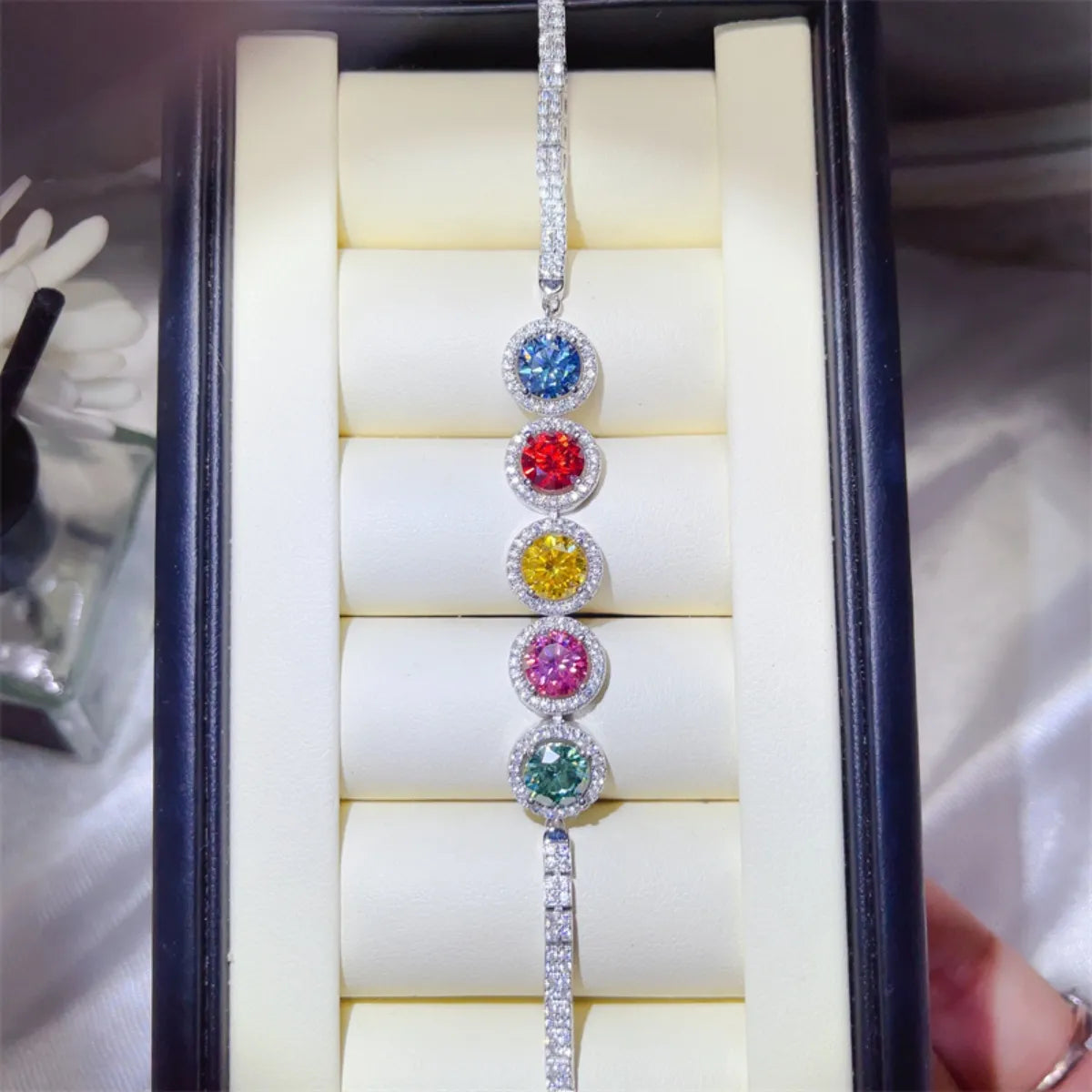 5-carat multicolor moissanite bracelet in sterling silver  in a jewelry box