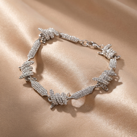 Virelli pavé barbed link bracelet silver luxury statement bracelet by MerchLuxx on a beige fabric background