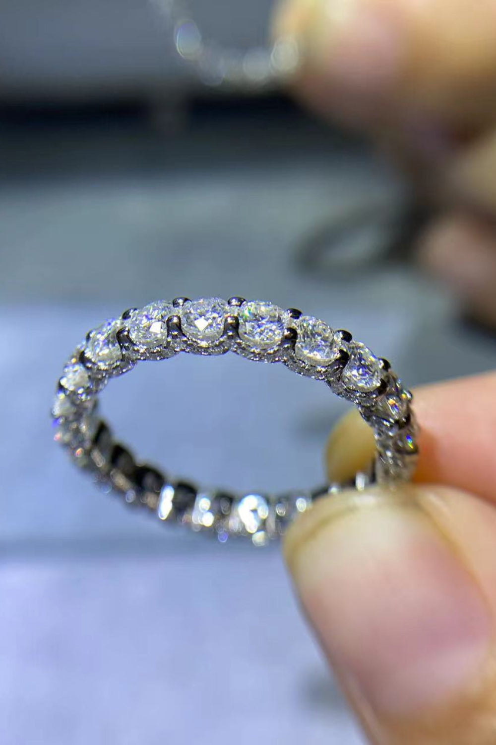 Eternyx™ Moissanite Eternity Ring in platinum-plated 925 sterling silver