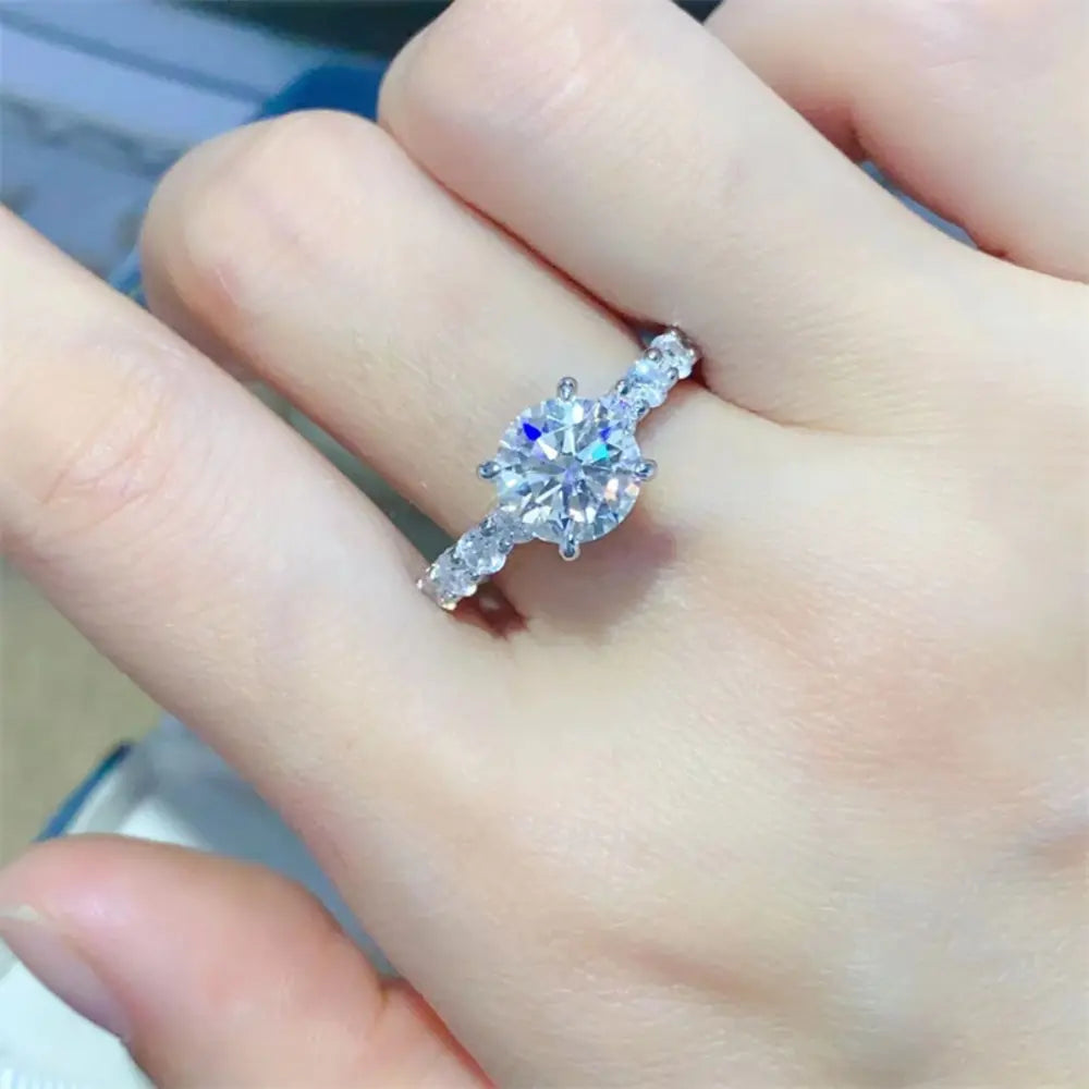 Valerique™ Side Stone Moissanite Ring worn on hand