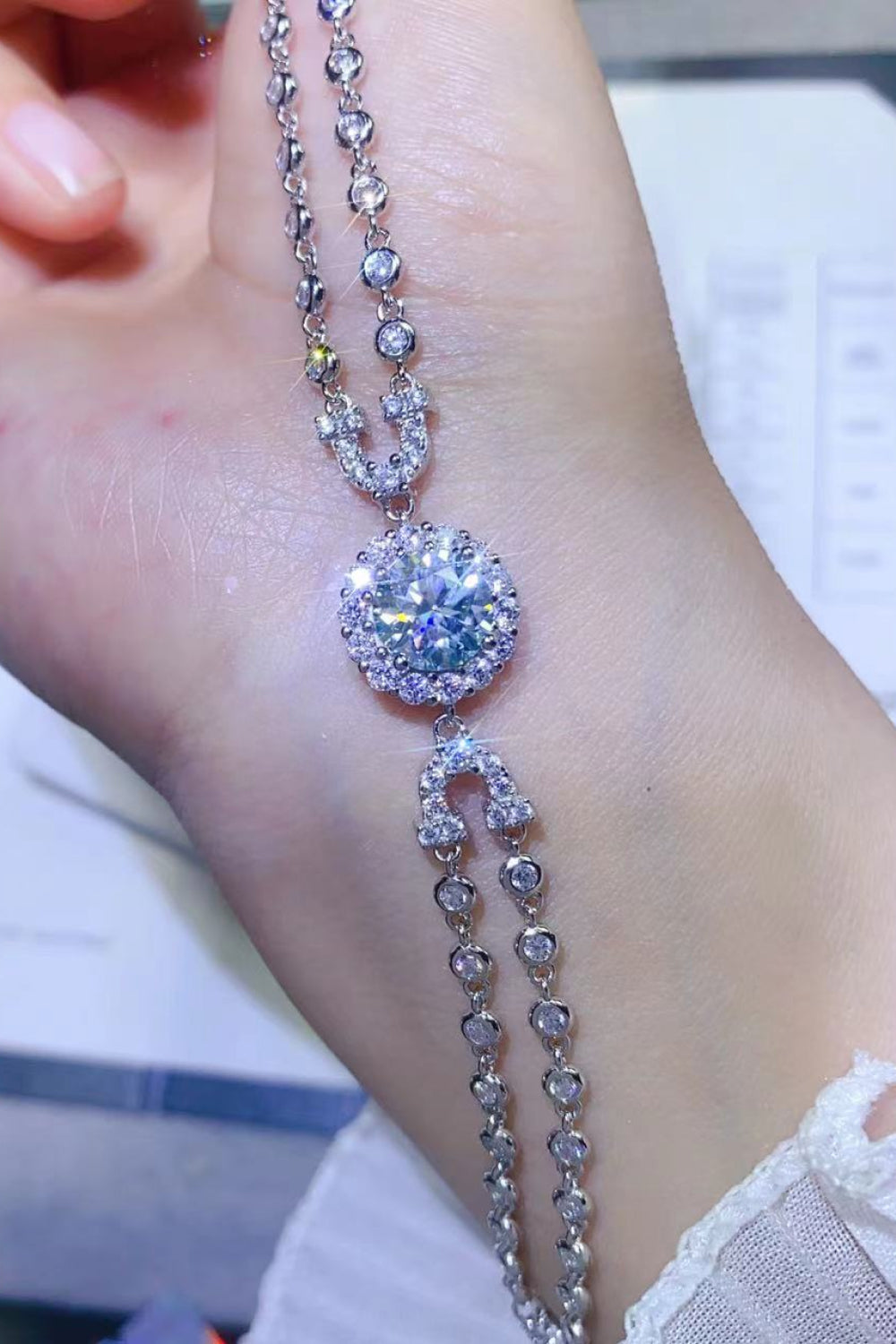 Radiella 2-carat moissanite halo bracelet in platinum-plated sterling silver by MerchLuxx