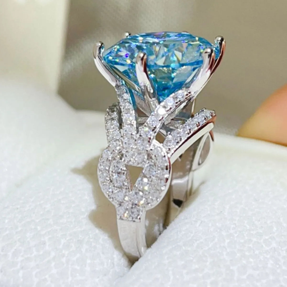 Azuréa blue moissanite statement ring showing elevated side setting