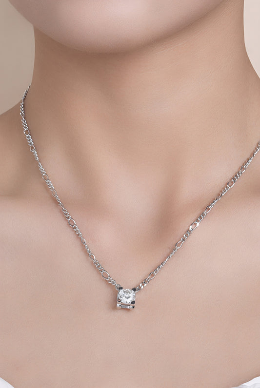 Close up of a women wearing 2 carat moissanite solitaire pendant necklace in platinum-plated 925 sterling silver