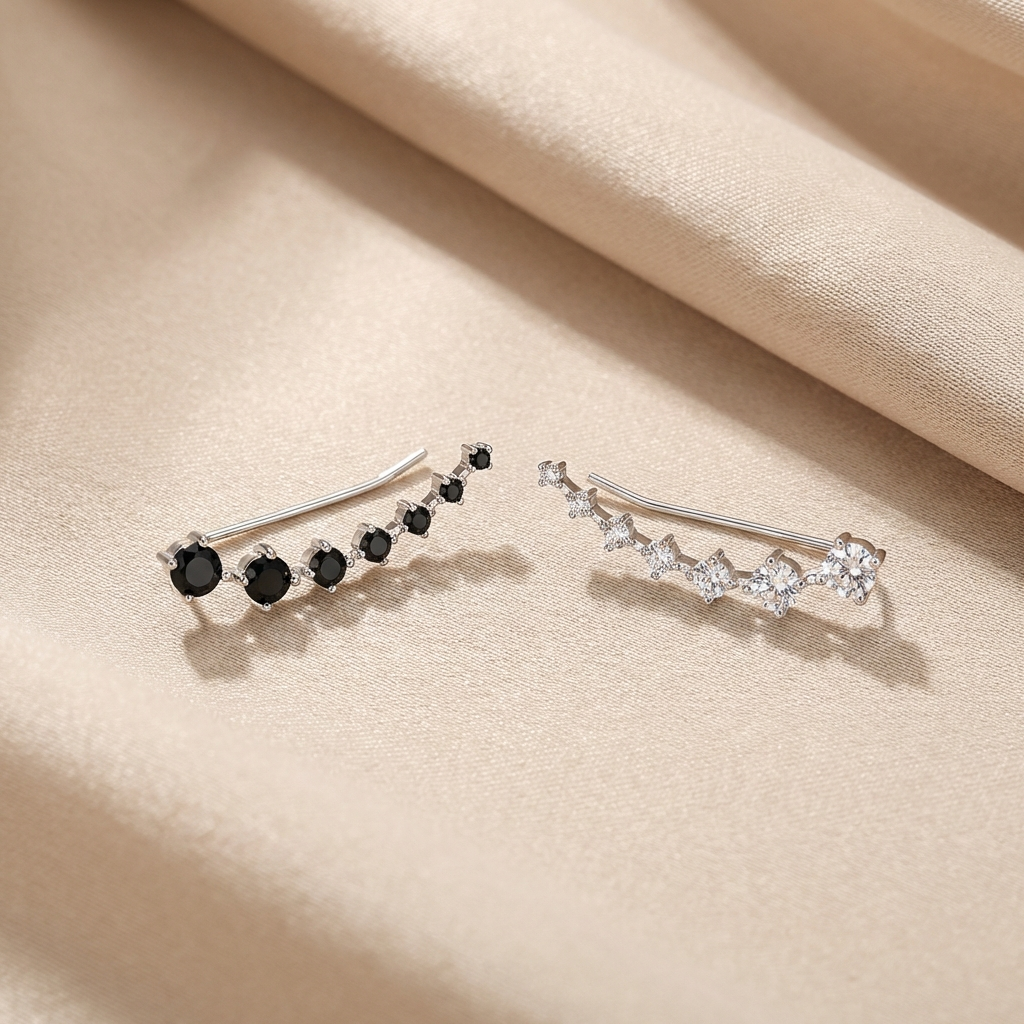 Platinum-plated sterling silver 1.9 carat moissanite ear climber earrings by MerchLuxx with round brilliant stones.