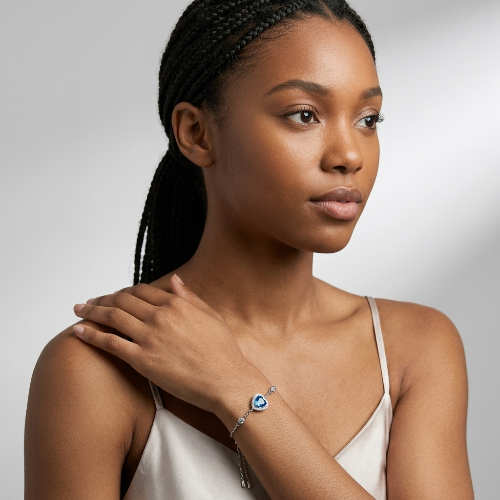 Celestara blue moissanite heart bracelet in platinum-plated sterling silver with heart accents by MerchLuxx