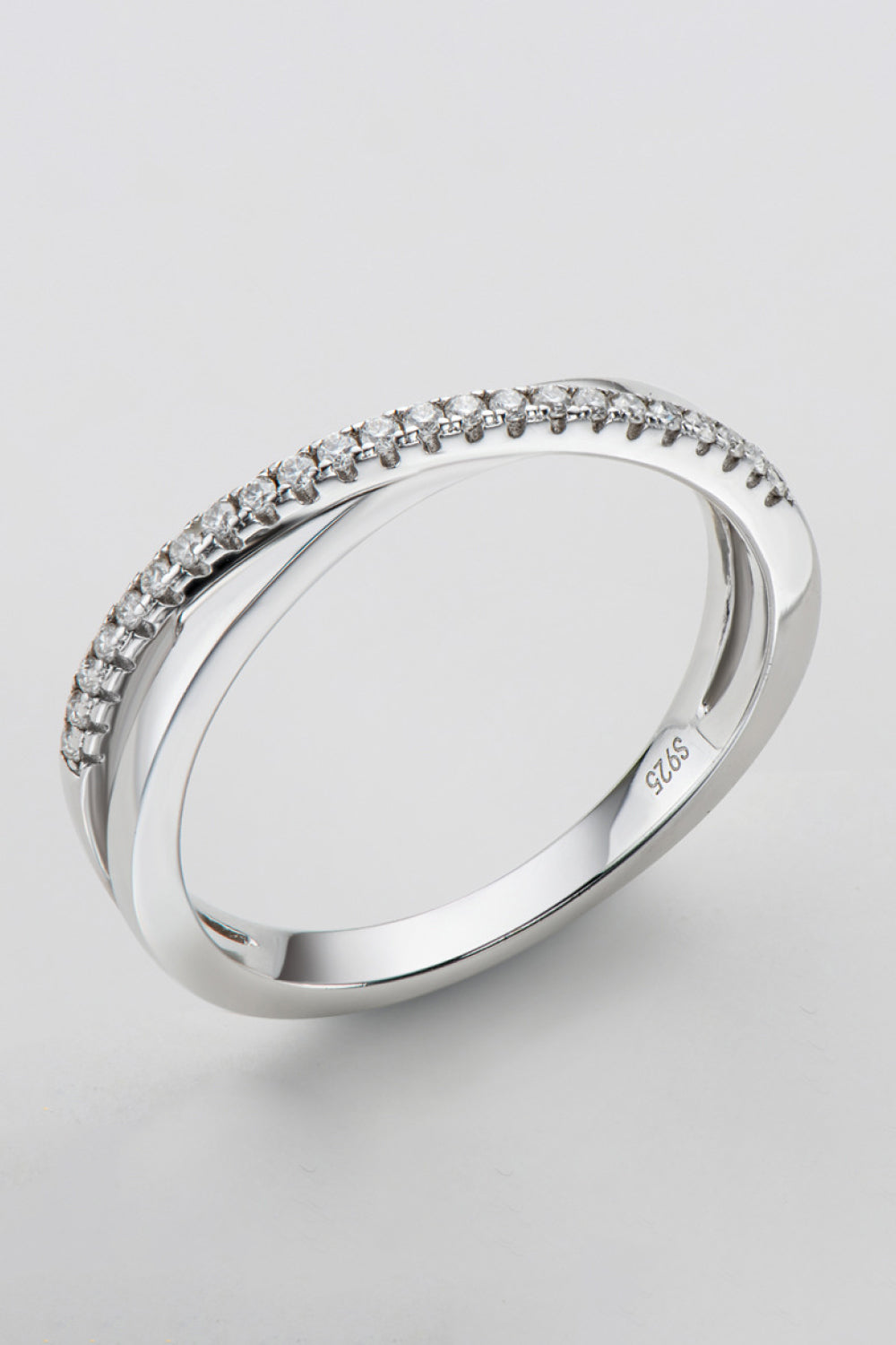 Side profile of platinum-plated infinity moissanite ring