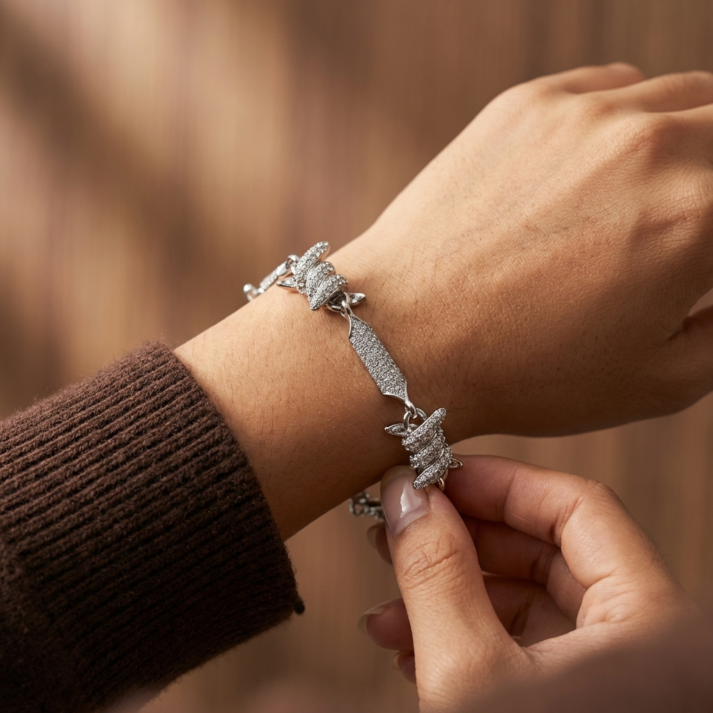 A woman's arm wearing the Virelli pavé barbed link bracelet silver luxury statement bracelet by MerchLuxx