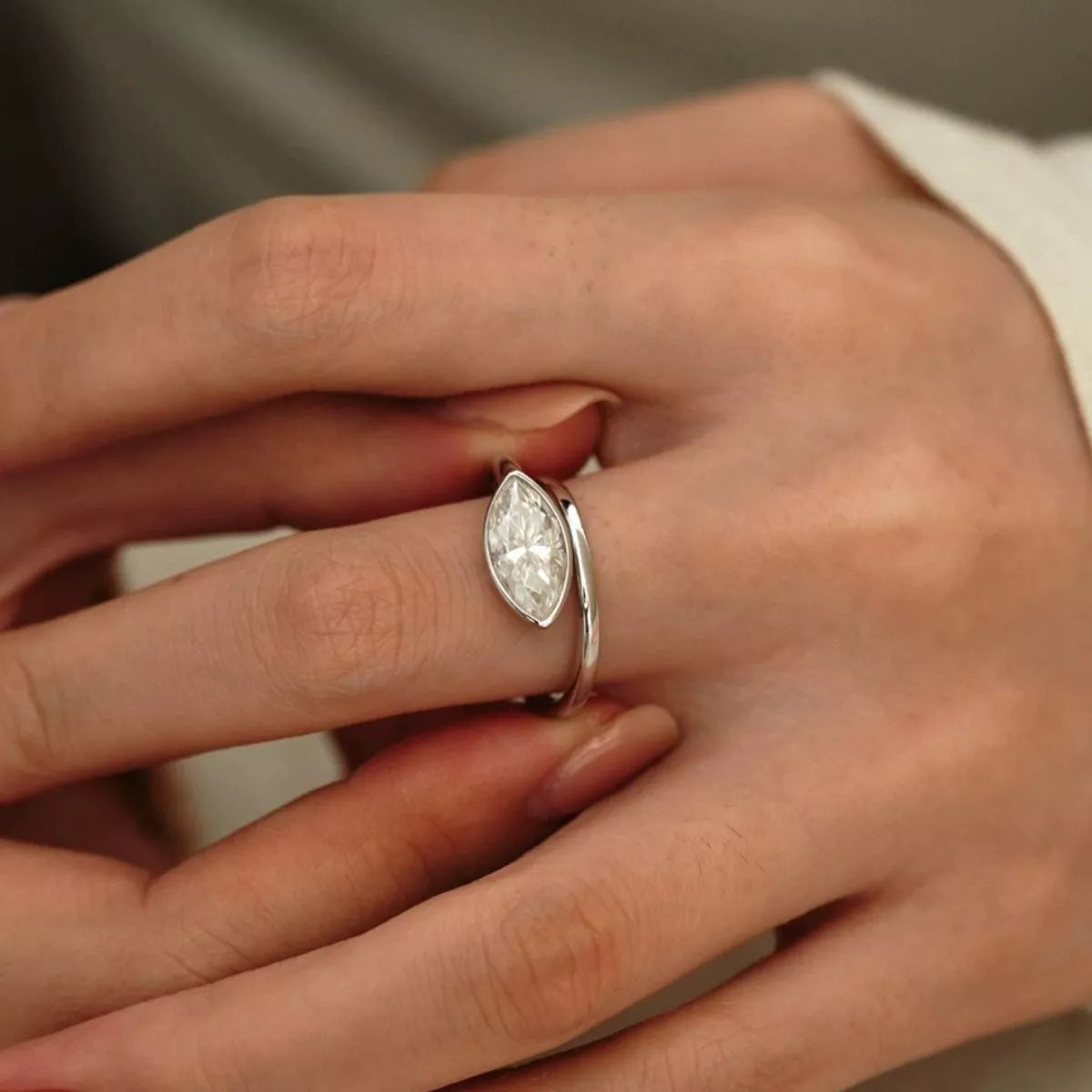 Woman wearing the Lunara™ Marquise Bypass Ring