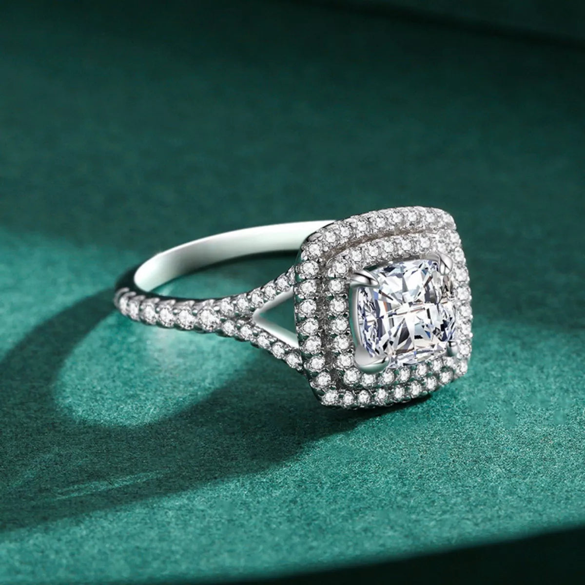 Side view of the Virella™ radiant-cut double halo moissanite ring