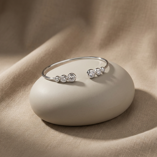 1.8 carat moissanite bracelet in platinum-plated sterling silver Aureline luxury bracelet by MerchLuxx on a beige stone