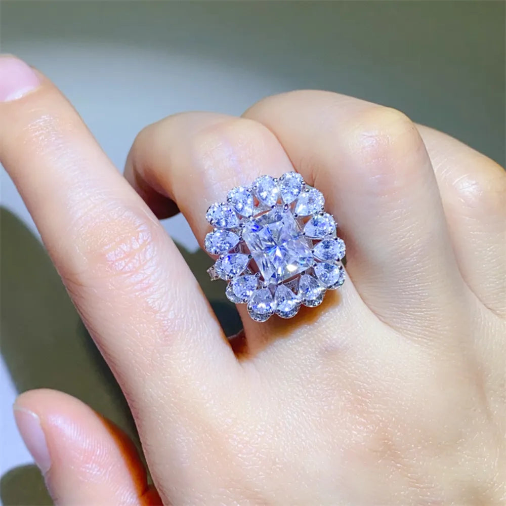 Regalisse 3-carat moissanite floral halo ring in sterling silver by MerchLuxx