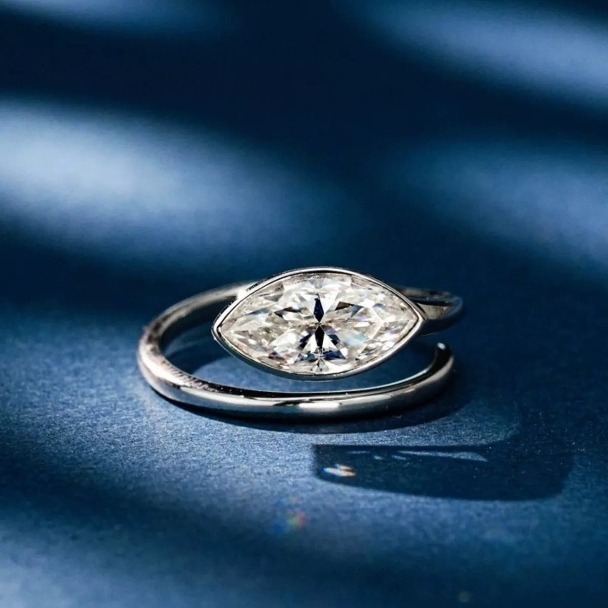 Top view of Lunara™ marquise bypass engagement ring