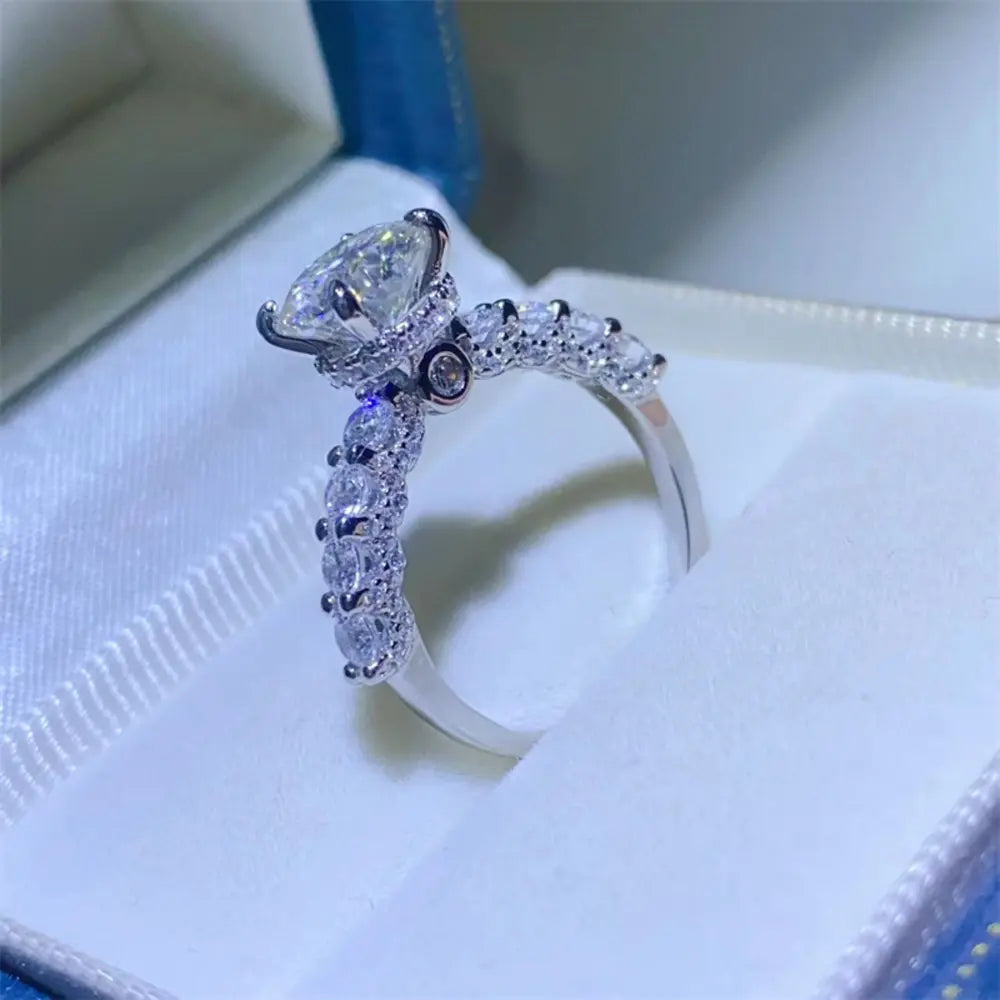 Side profile of platinum-plated 925 sterling silver moissanite ring