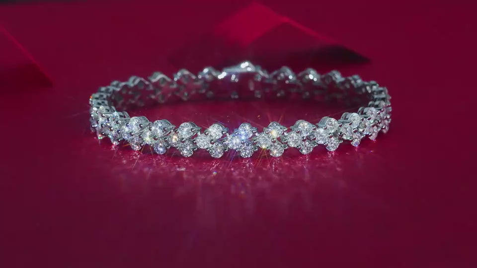 A video showing the brilliant sparkle of the Luminara moissanite cluster tennis bracelet in S925 sterling silver luxury wrist jewelry by MerchLuxx 