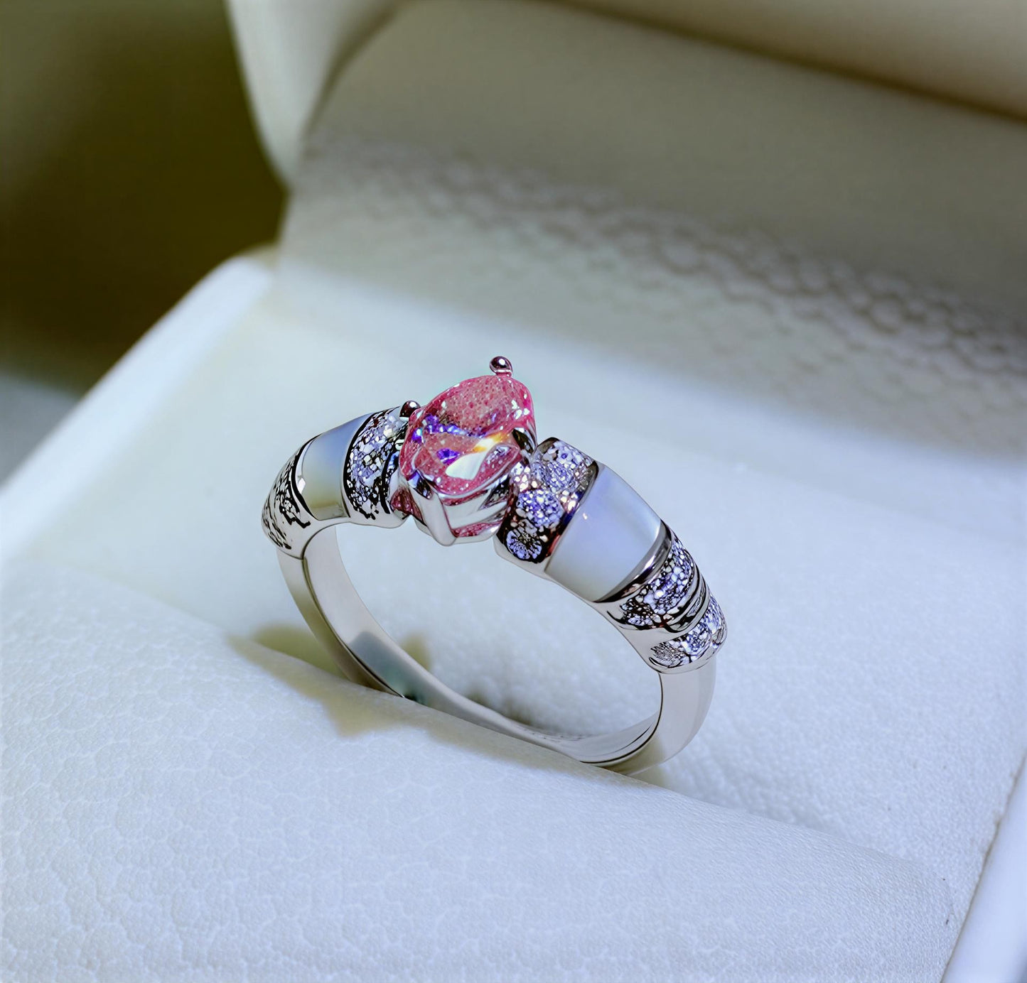 Veloria 1-carat pink and blue moissanite accent ring in platinum-plated sterling silver by MerchLuxx in a white jewelry box